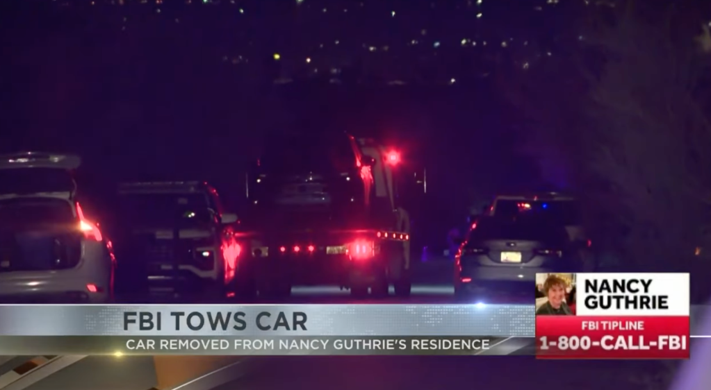 FBI tows car from Nancy Guthrie's residence.